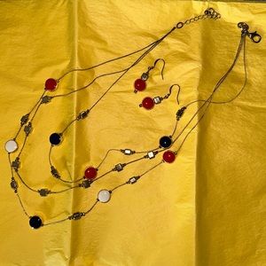 Tiered necklace set from charming Charlie gold with red white and blue circles